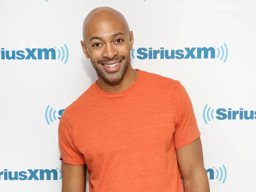 Sir John Barnett celebrity makeup artist working backstage beauty industry representation activism global influence