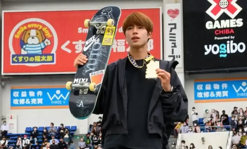 Yuto Horigome performing skateboard trick during Olympic competition, two-time gold medalist from Japan